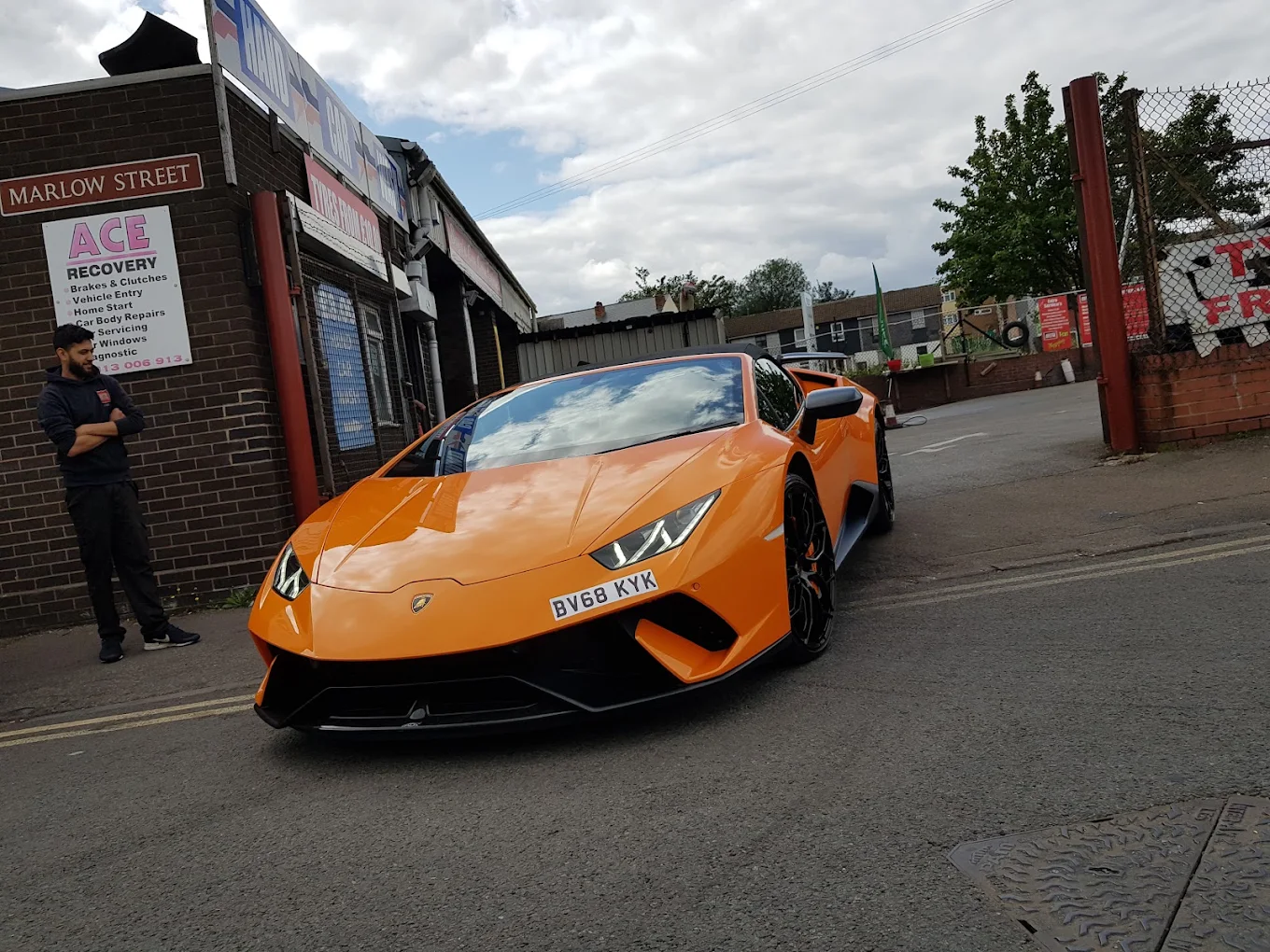 A Lamborghini customer car being cared for at Marlow's Street Car Wash